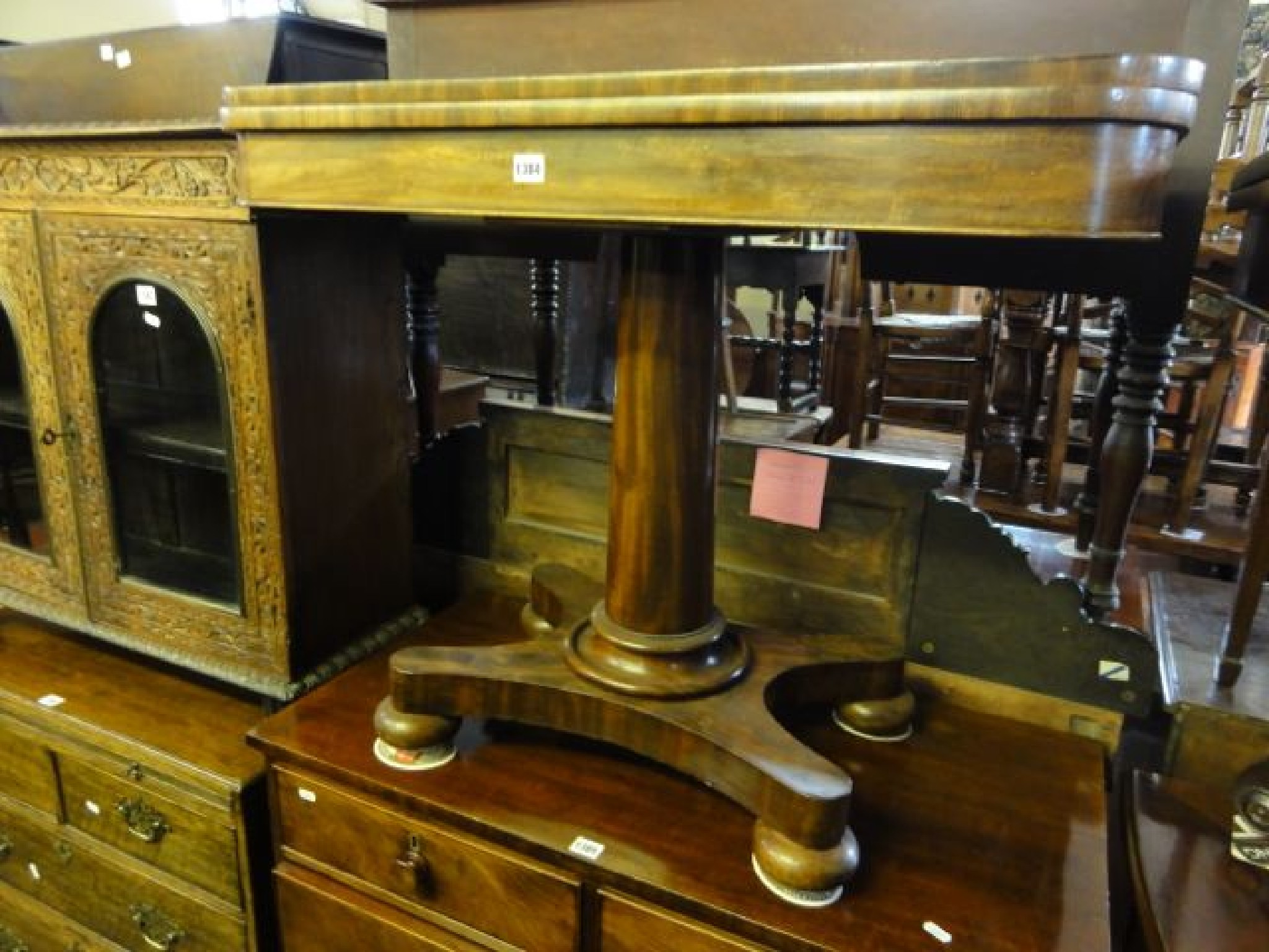 Appraisal: A Georgian mahogany D end fold over top card table