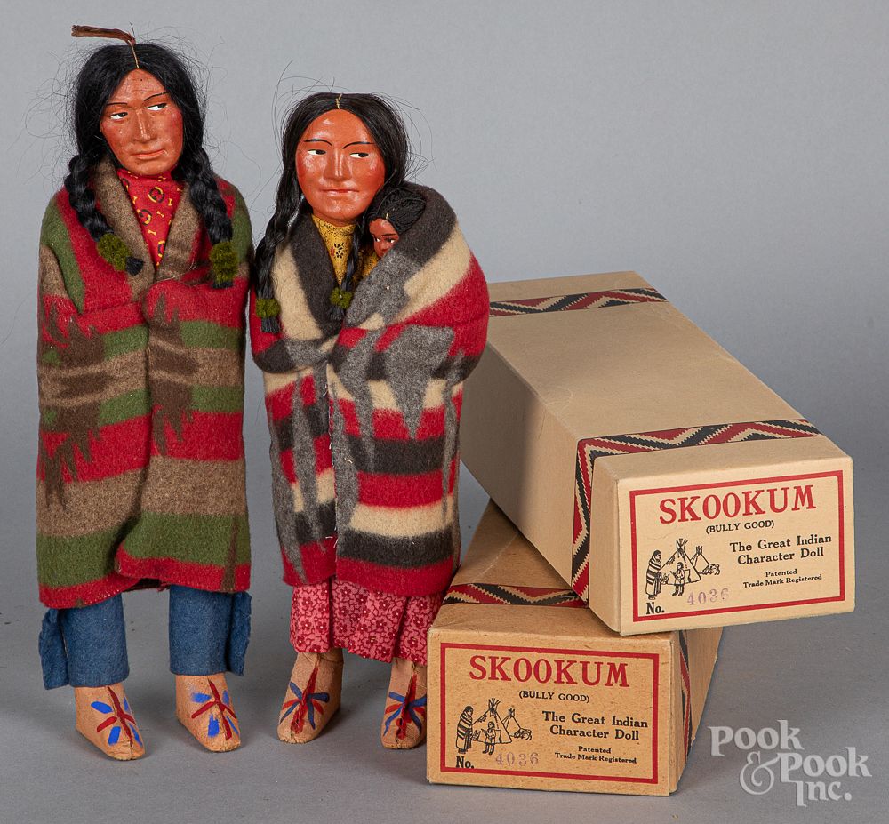 Appraisal: Two composition Skookum Indian dolls Two composition Skookum Indian dolls