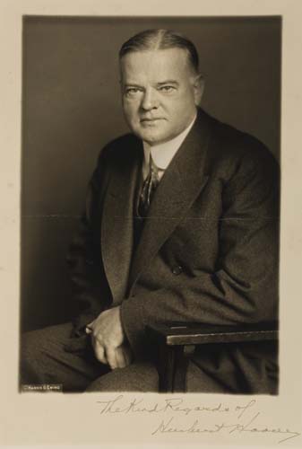 Appraisal: HOOVER HERBERT Photograph Signed a seated portrait by Harris Ewing