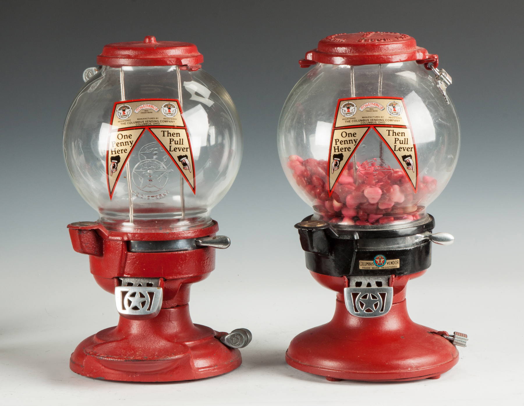 Appraisal: Two Vintage Columbus Vending Co Gumball Machines Cast iron