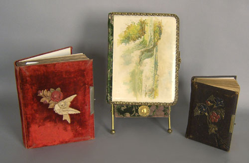 Appraisal: Three Victorian photo albums together with a stand