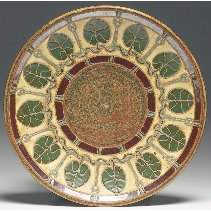 Appraisal: Common Ground Pottery charger contemporary stylized leaves against a mottled