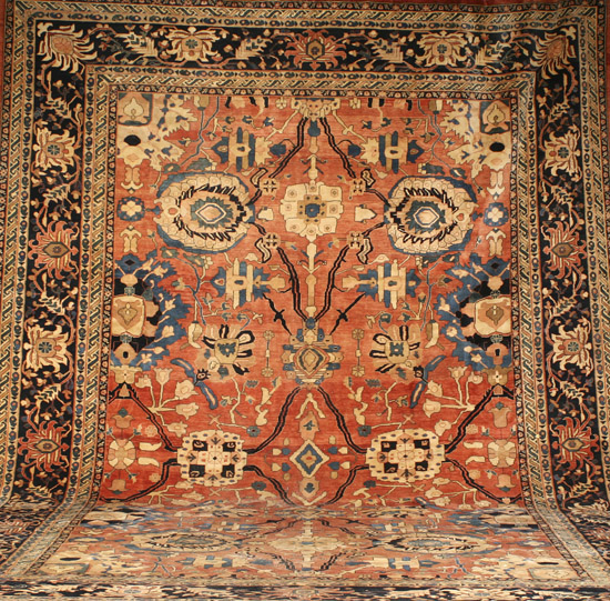 Appraisal: Heriz Rug Circa Shaded red ground with herati field within