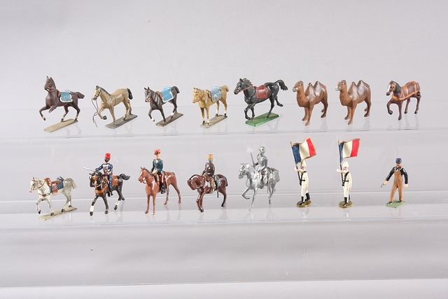 Appraisal: One miscellaneous lot of metal camels horses and figures by