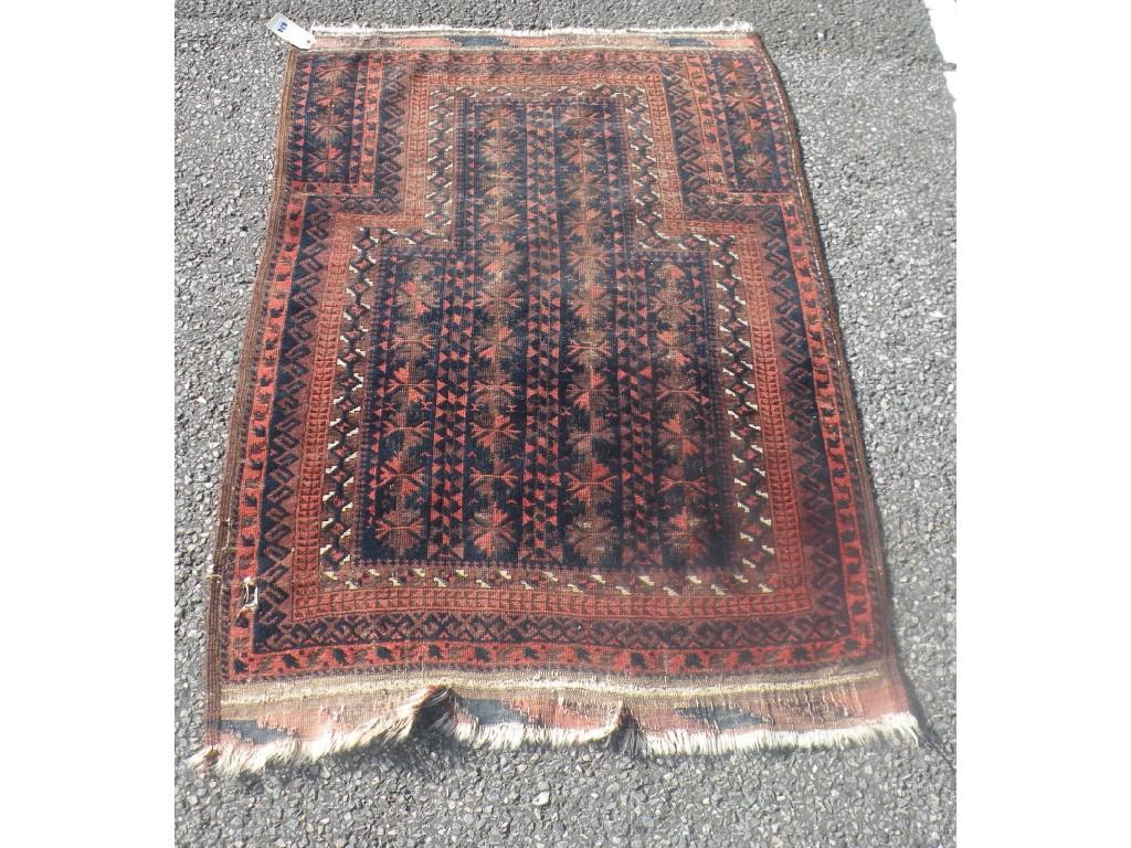 Appraisal: An Eastern prayer rug with a design of small medallions