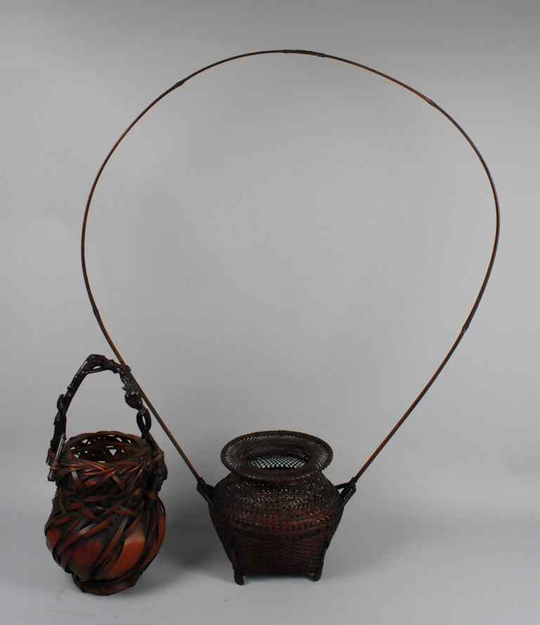 Appraisal: TWO JAPANESE SPLIT BAMBOO IKEBANA BASKETS the first of baluster