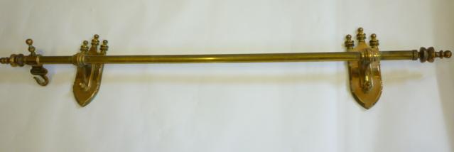 Appraisal: A VICTORIAN GOTHIC BRASS CURTAIN POLE by J Pashley Oakenshaw