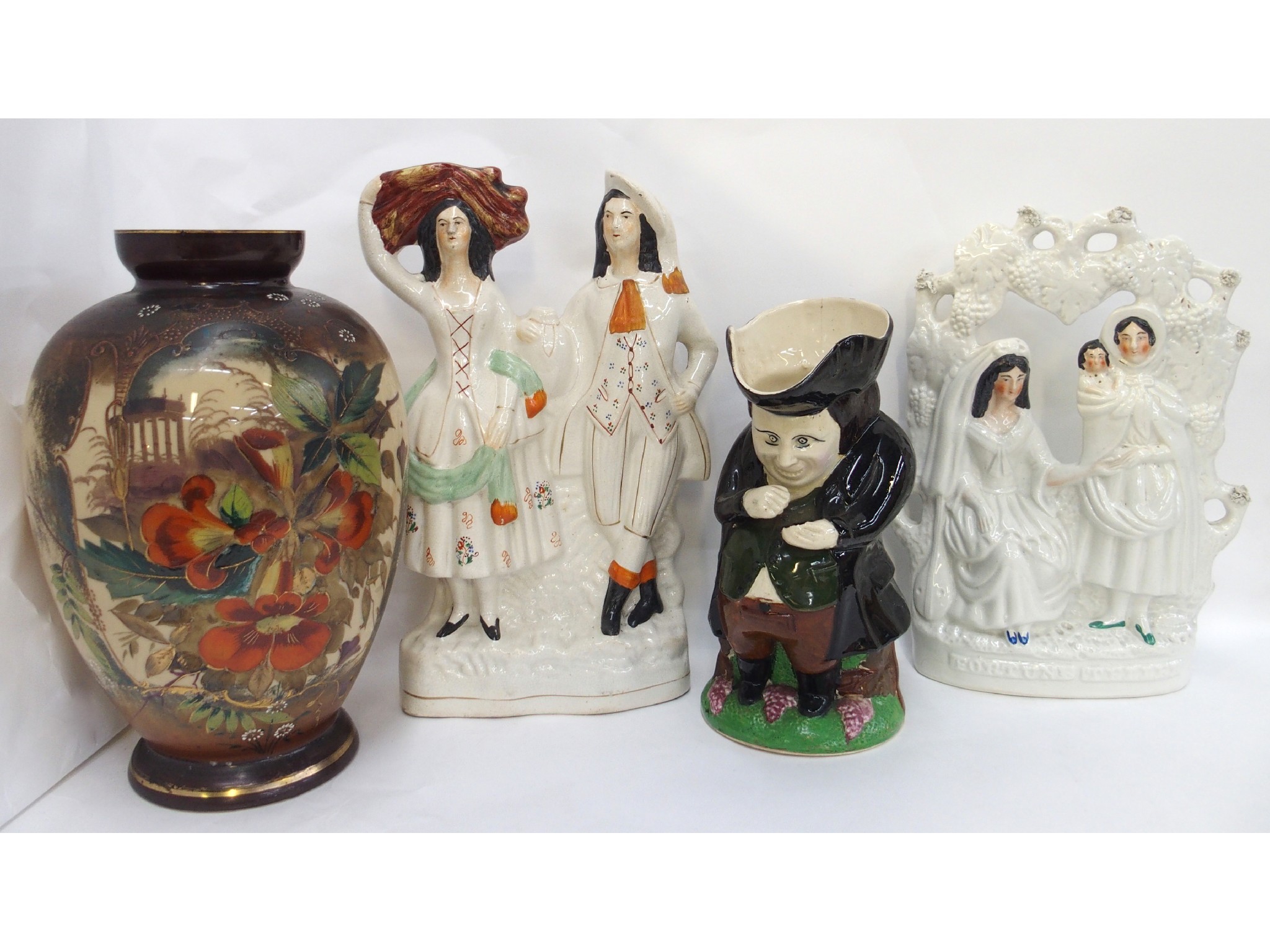 Appraisal: Staffordshire figure 'Fortune Teller' another of a couple pottery toby