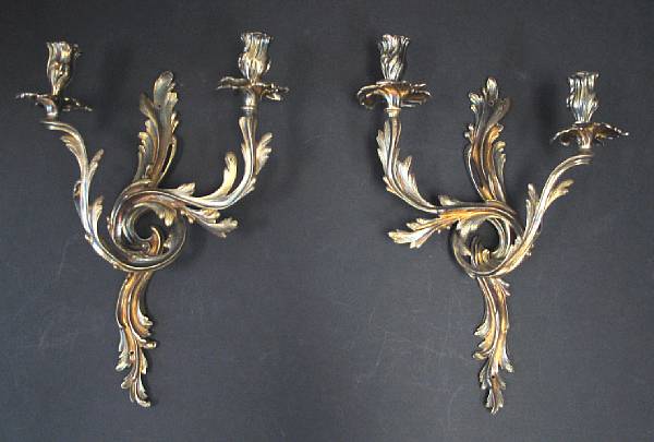 Appraisal: A pair of Louis XV style gilt bronze two-light bras