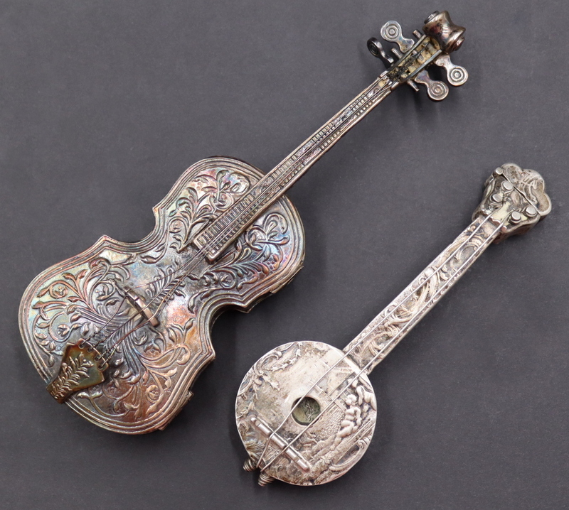 Appraisal: SILVER SILVER INSTRUMENT OBJECTS D'ART Includes a hinged box in