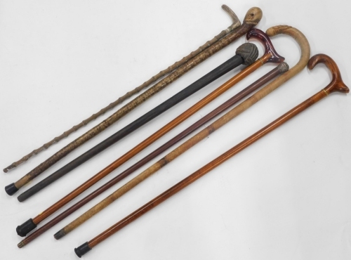 Appraisal: Various walking sticks a dandy cane with turned plated knop