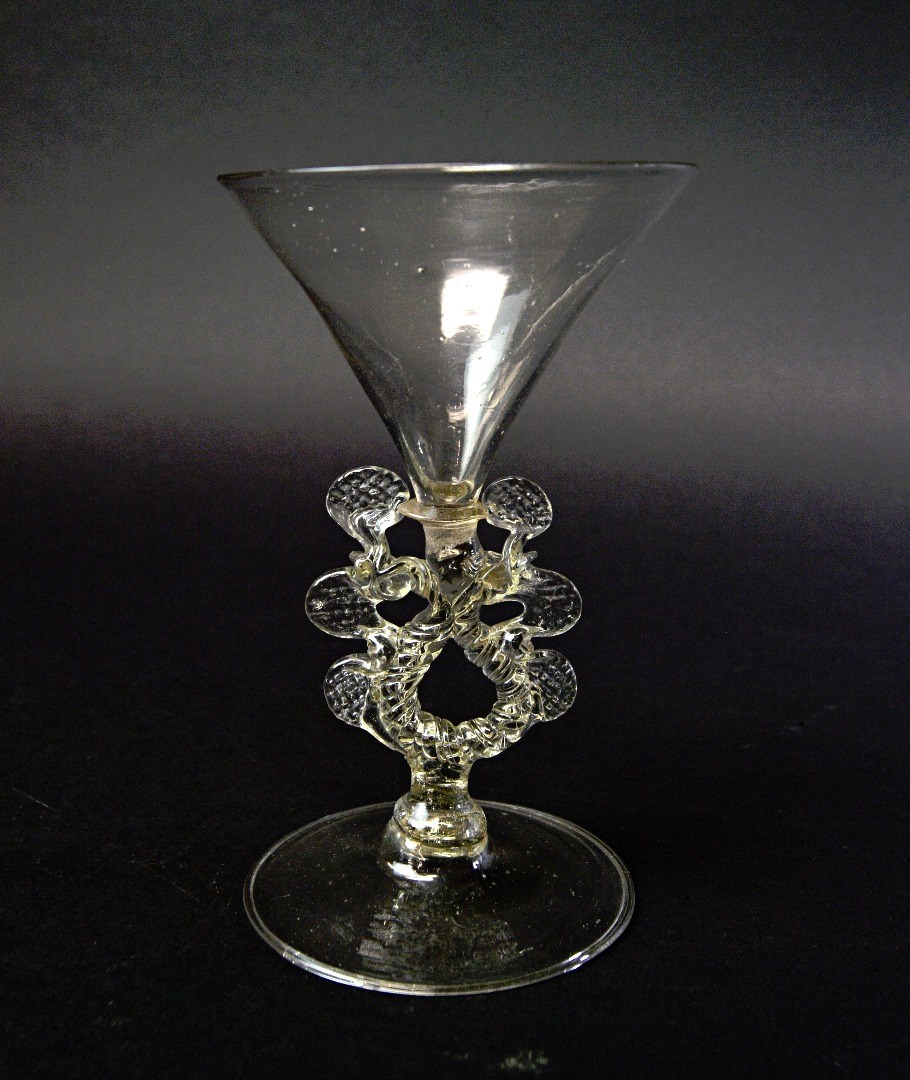 Appraisal: A Facon de Venise wine glass with funnel bowl over