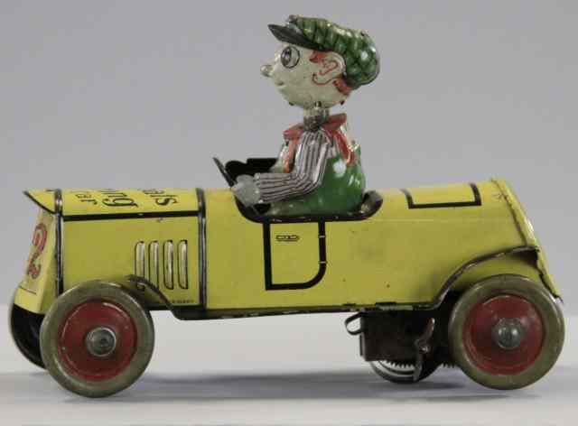 Appraisal: DISTLER ''WHAT'S WRONG'' CAR Whimsical lithographed tin auto features boy