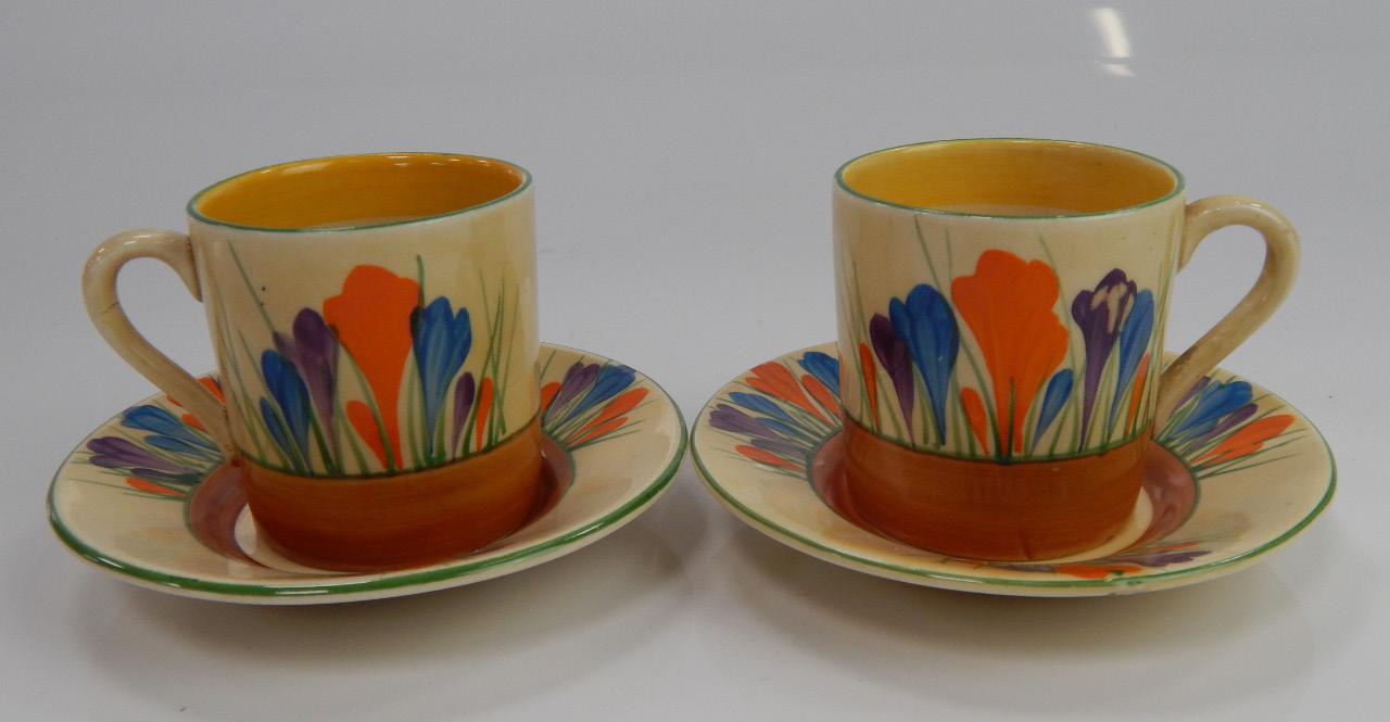 Appraisal: Two Clarice Cliff Bizarre Crocus pattern coffee cans and saucers