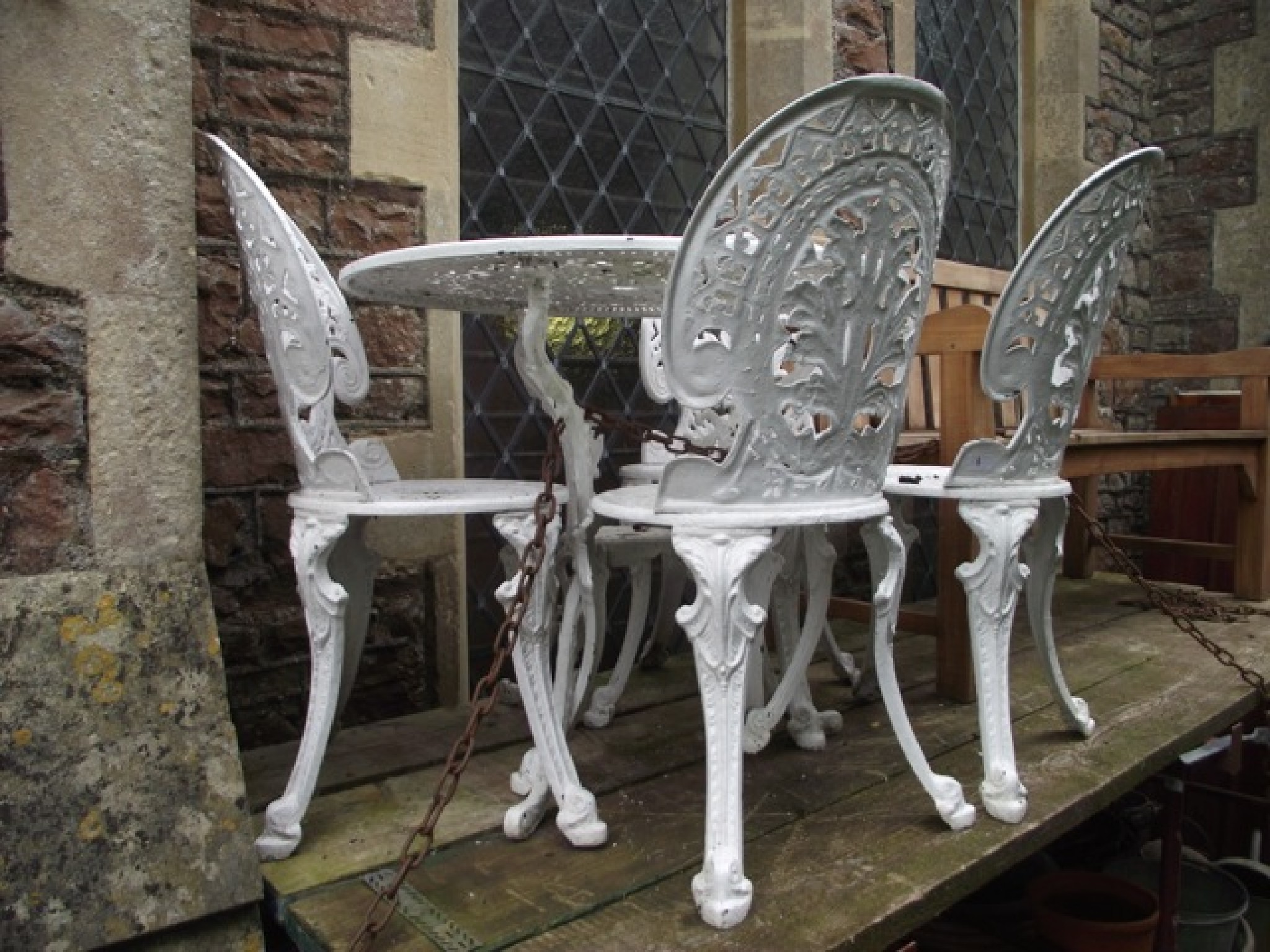 Appraisal: A Victorian style cast aluminium five piece garden terrace set