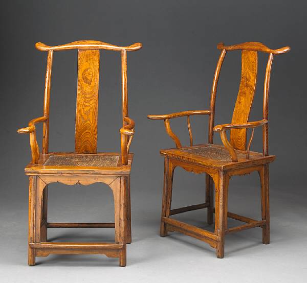 Appraisal: A pair of yoke back armchairs th Century Each constructed