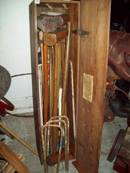 Appraisal: A COLLECTION OF CROQUET MALLETS IN AN ANTIQUE BOX