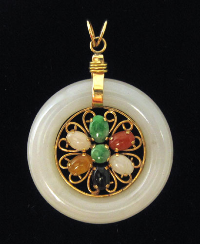 Appraisal: MULTI-COLOR JADE AND YELLOW GOLD PENDANT The k gold pendant