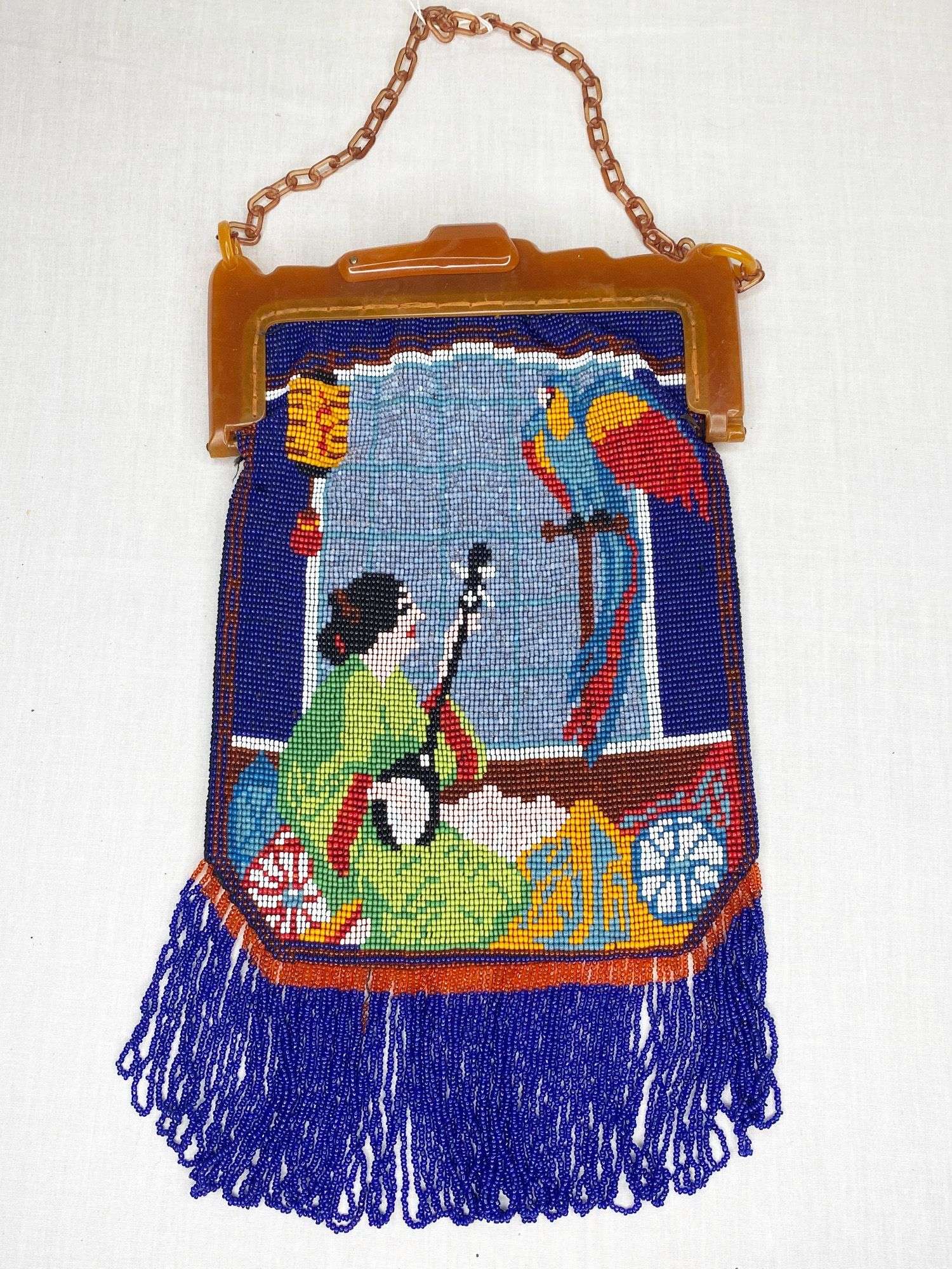 Appraisal: Micro Beaded Geisha and Macaw Hand Bag long widest Condition