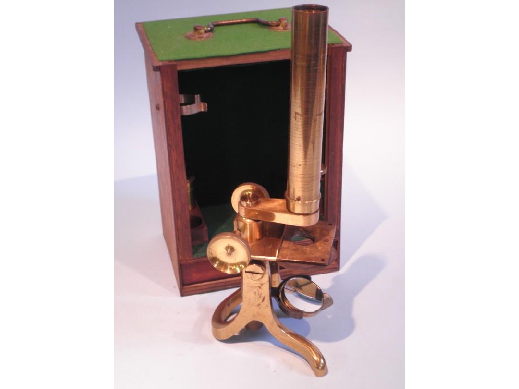 Appraisal: A brass students microscope complete with lenses in a later