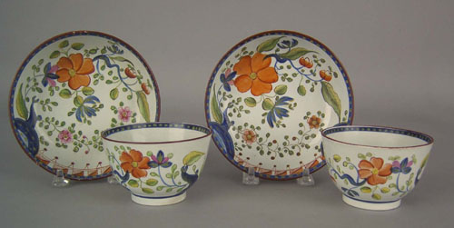 Appraisal: Two Gaudy Dutch cups and saucers th c in the