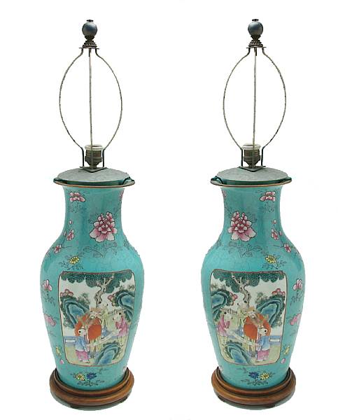 Appraisal: A pair of Chinese enameled vases with figural panels on