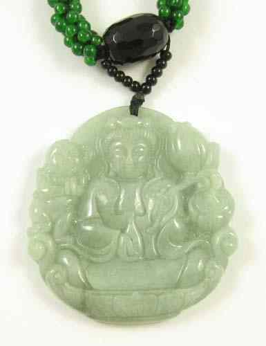 Appraisal: CHINESE JADEITE OVOID CARVED PENDANT depicting Buddha in relief with