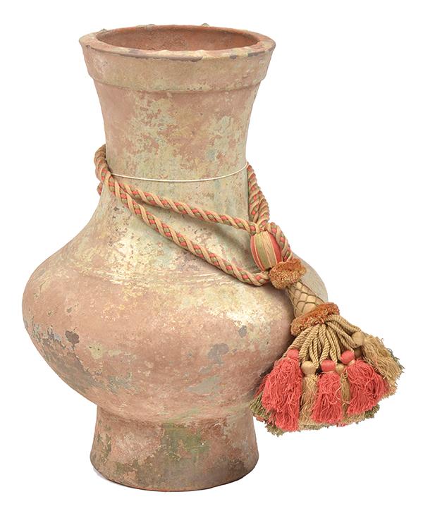 Appraisal: A HAN PERIOD GLAZED TERRACOTTA JAR of waisted form on