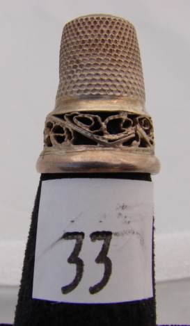 Appraisal: Silver thimble with filigree band