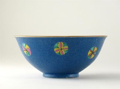 Appraisal: A Chinese blue sgraffito ground bowl decorated with seven famille