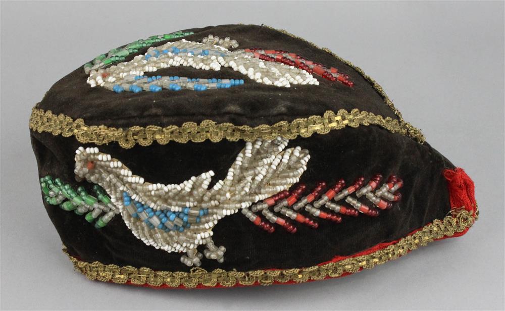 Appraisal: NORTHEAST BEADED TRADE CLOTH HAT Glengarry-type with figural beadwork decoration