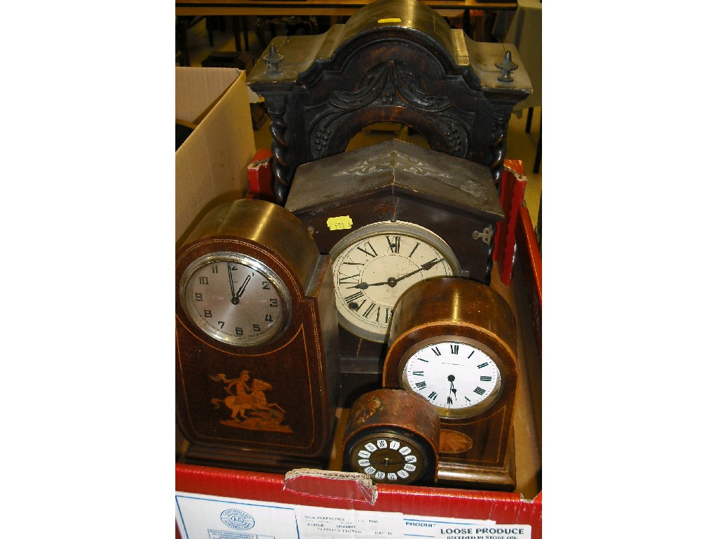 Appraisal: Four various size mantel clocks and a carved oak clock