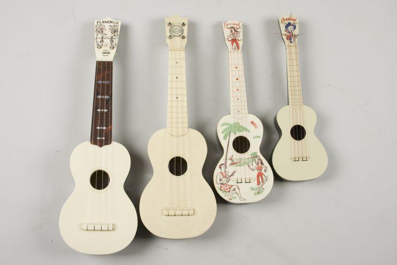 Appraisal: Four Vintage Plastic Ukuleles ca s - s includes Fin-Der