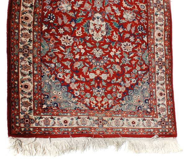 Appraisal: A Sarouk carpet together with two Kerman rugs and a