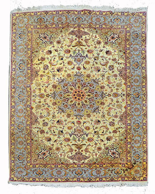 Appraisal: A TABRIZ WHITE GROUND RUG with central polychrome medallion within