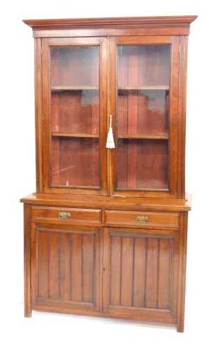 Appraisal: A late Victorian walnut bookcase with fixed cornice above two