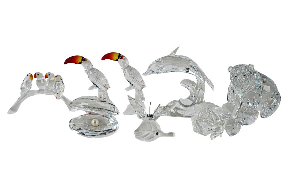 Appraisal: EIGHT SWAROVSKI SILVER CRYSTAL FIGUREScomprising Dolphin Grizzly The Rose Toucan