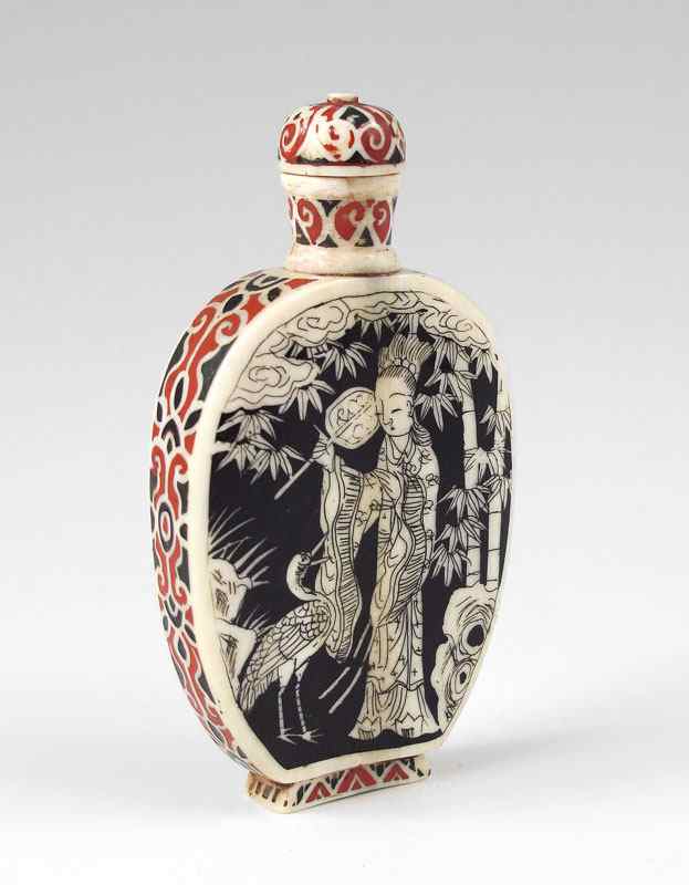 Appraisal: INLAID IVORY SNUFF BOTTLE Paint enamel genre scenes to front