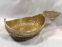 Appraisal: A large Russian silver gilt kovsh with chased and engraved