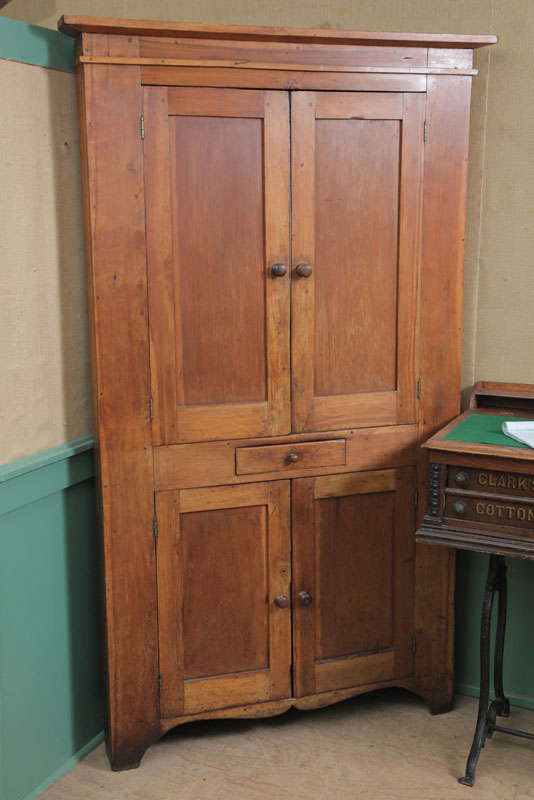 Appraisal: ONE PIECE CORNER CUPBOARD Pine and of typical form with