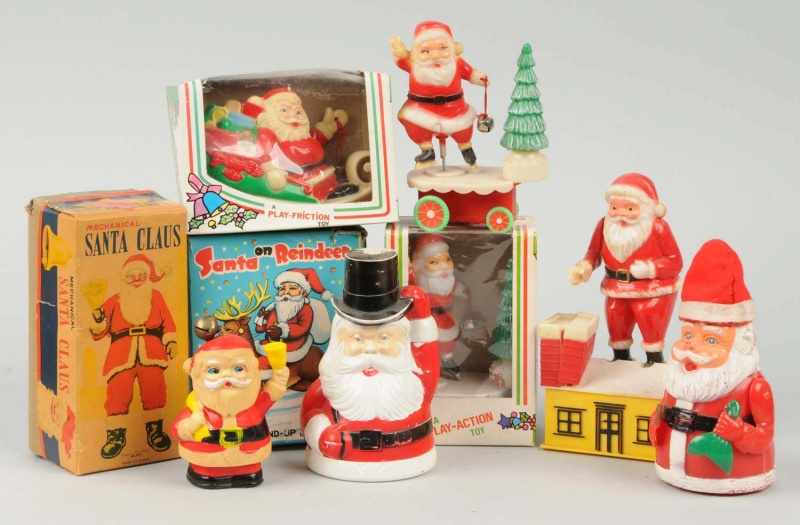 Appraisal: Lot of Plastic Santas Description Circa Two are banks and