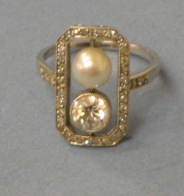 Appraisal: AN ART DECO DIAMOND AND PEARL RING comprising an old