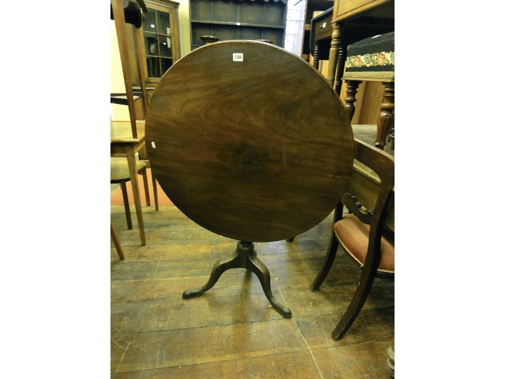 Appraisal: A Georgian mahogany snap top occasional table of circular form