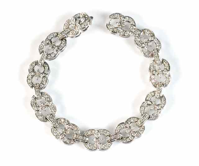 Appraisal: DIAMOND AND FOURTEEN KARAT GOLD BRACELET The - '' white