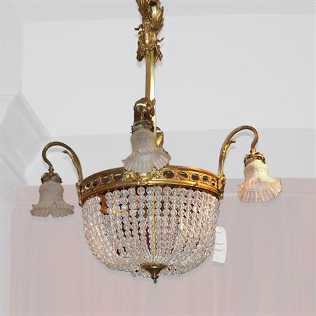 Appraisal: Louis XVI Style Gilt-Metal and Glass Seven-Light Chandelier Estimate -