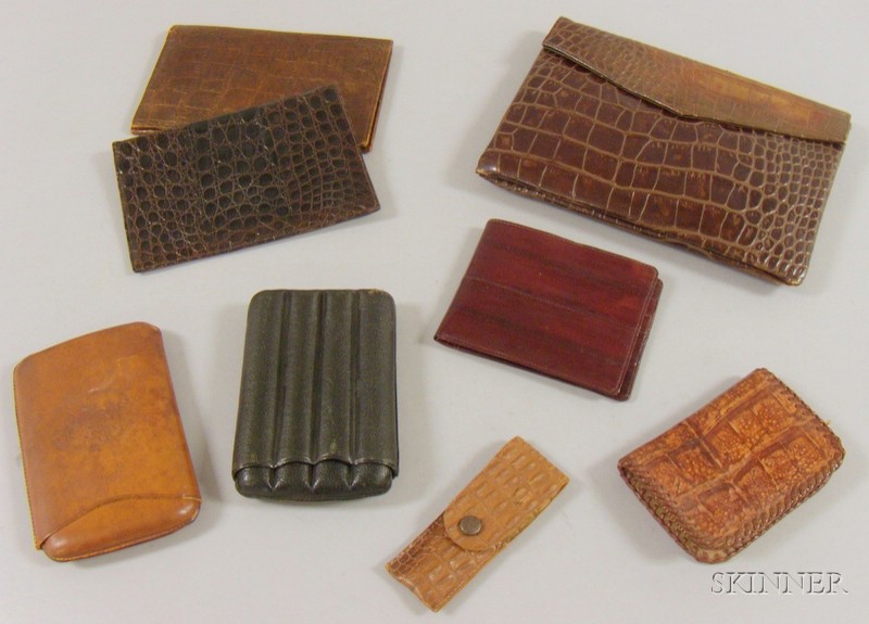 Appraisal: Seven Leather Items including purse change purse eel skin wallet