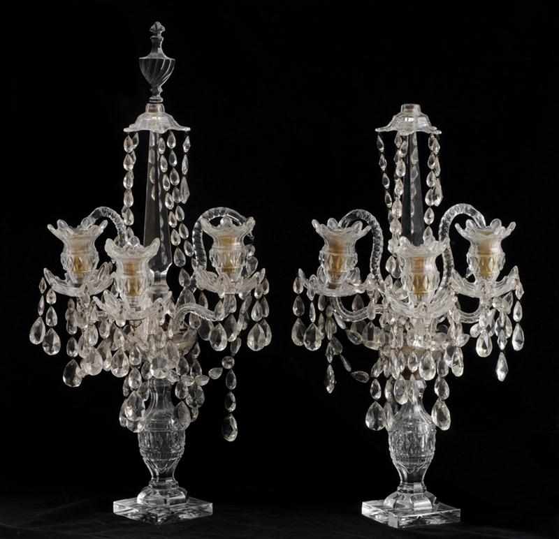 Appraisal: PAIR OF REGENCY CUT-GLASS THREE-LIGHT CANDELABRA Each vase stem supporting