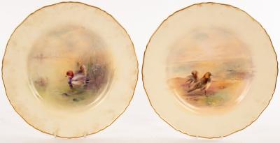 Appraisal: A pair of Royal Worcester plates painted a golden plover