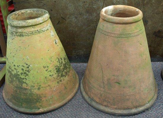 Appraisal: A pair of terracotta rhubarb forcers cm high