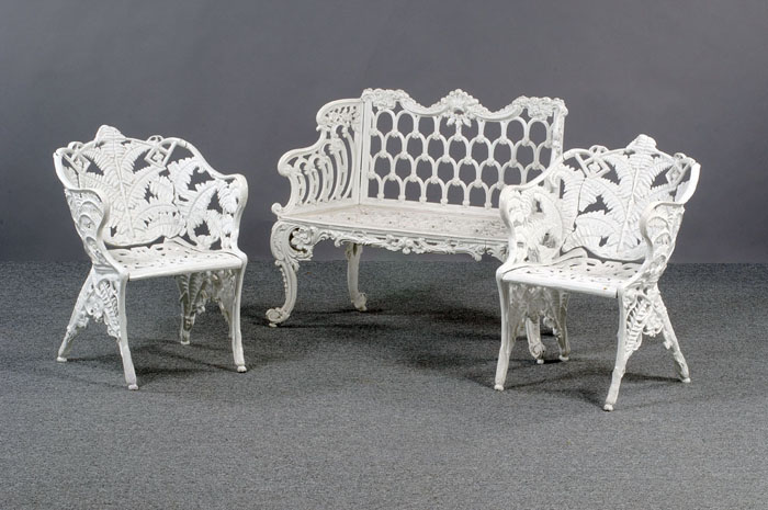 Appraisal: AMERICAN CAST-IRON GARDEN SETTEE AND A PAIR OF ARMCHAIRS The